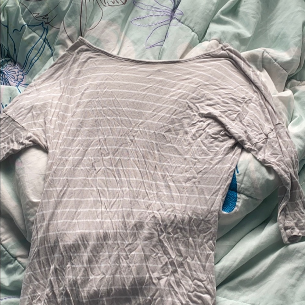 Half tee that is a cream color